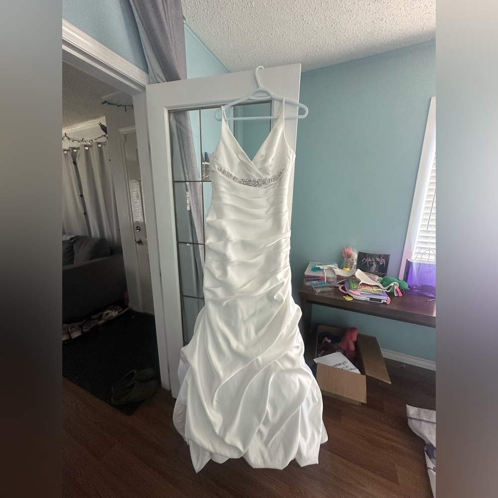 Elegant White Wedding Gown with Beaded Detail